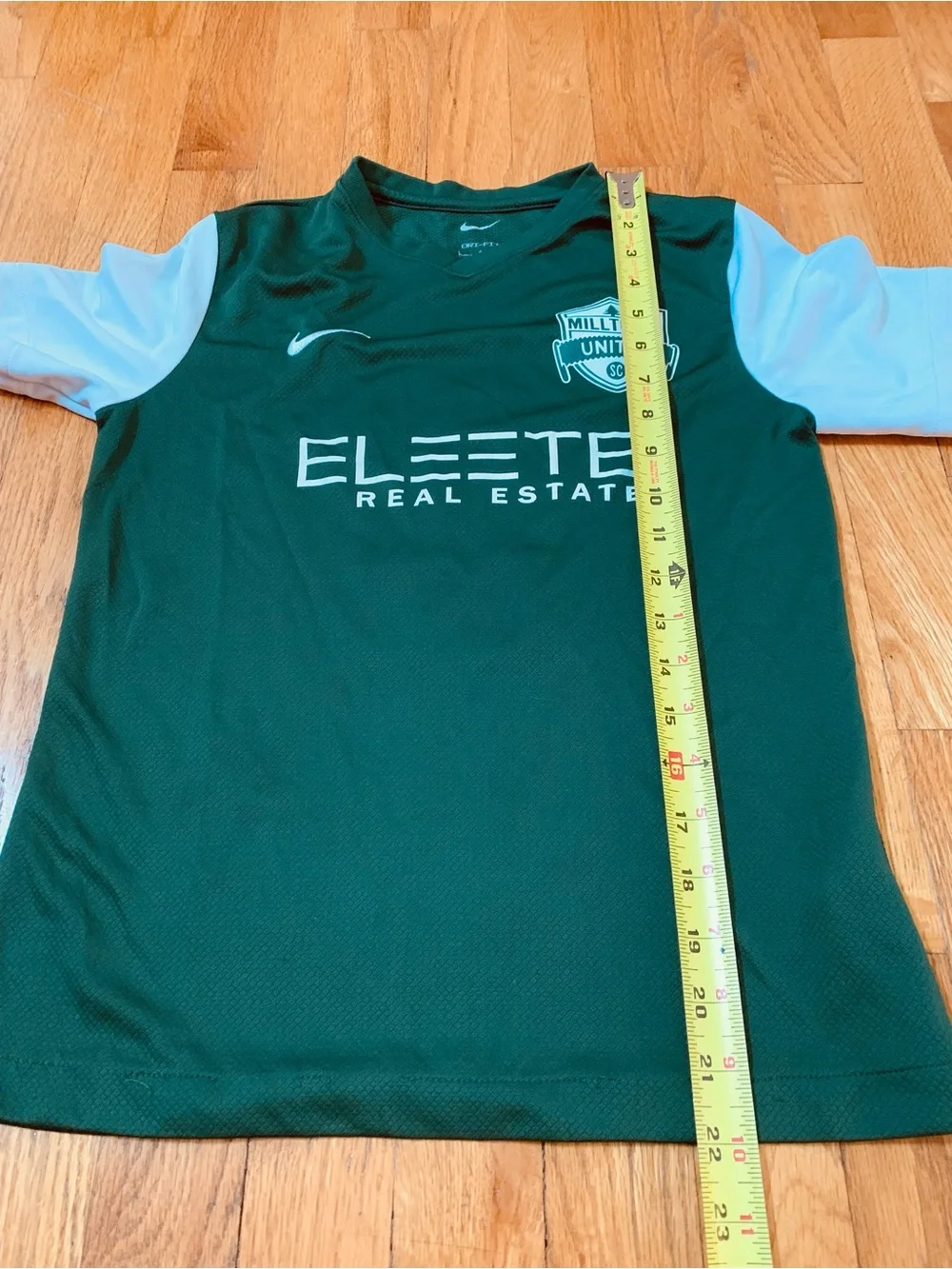 2 Nike Boys L Shirts : Defy Gravity' Nike tee and a green Milltown United jersey